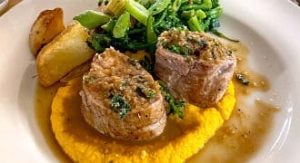 Pork with herb crumb & spiced carrot purée