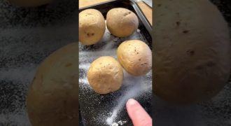 Baked potatoes on a bed of salt