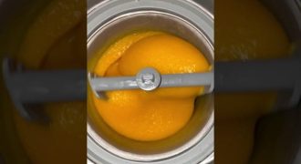 Churning mango sorbet